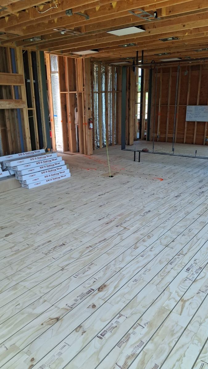 Wide view of radiant heated subfloor installation